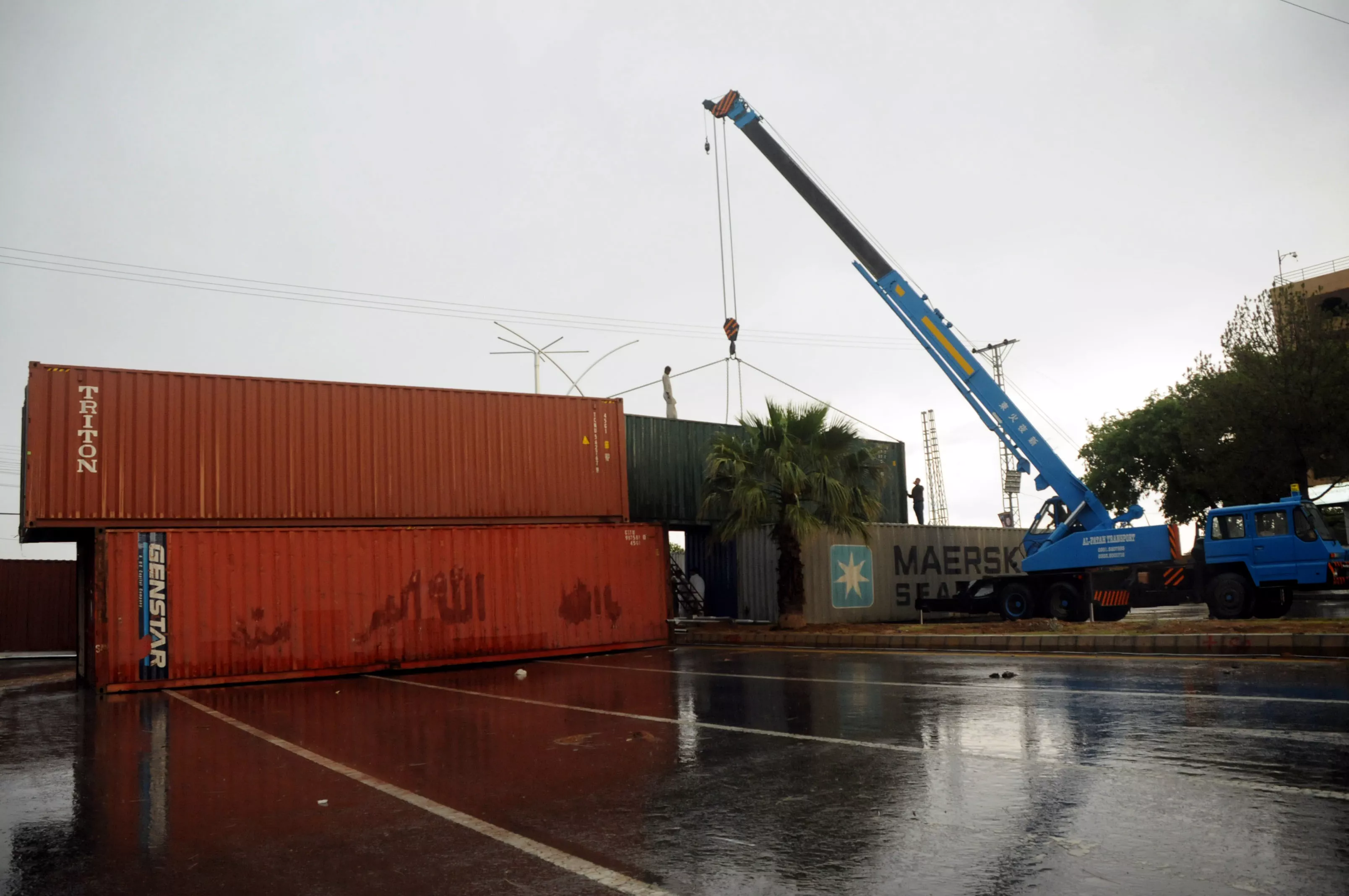 container loaded with chemicals overturns container loaded with chemicals overturns