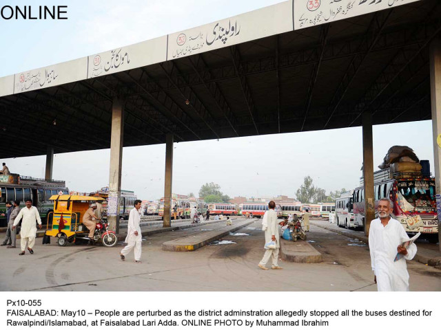people stand at deserted bus stand in faisalabad on saturday photo online people stand at deserted bus stand in faisalabad on saturday photo online