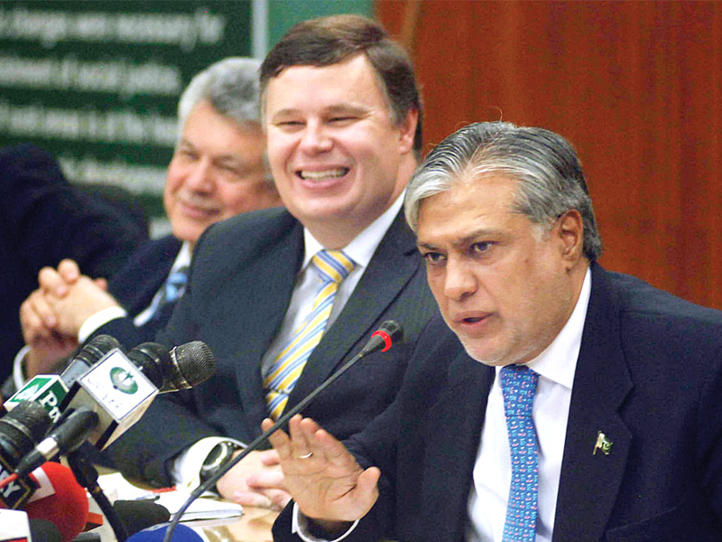 ishaq dar addresses media alongside the imf mission chief photo app