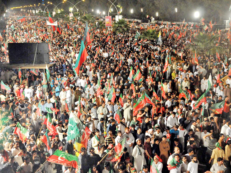 pti supporters listen to party chief imran khan s address in islamabad photo zafar aslam express