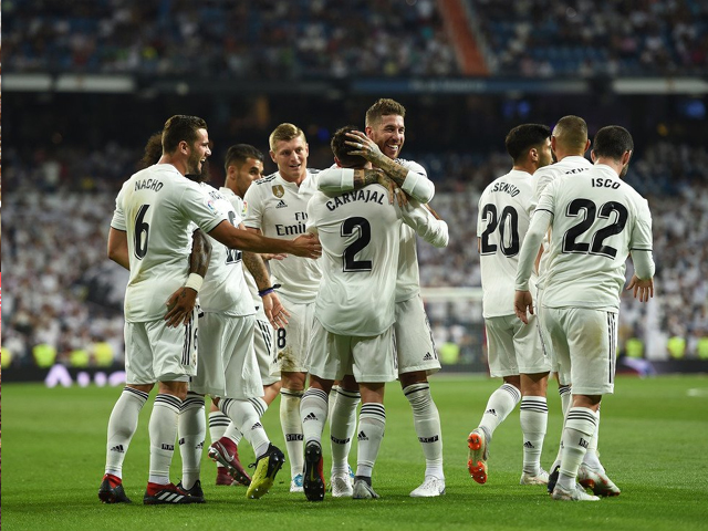 dani carvajal of real madrid celebrates with sergio ramos after scoring his teams opening goal during the la liga match between real madrid cf and getafe cf at estadio santiago bernabeu on august 19 2018 in madrid spain photo getty