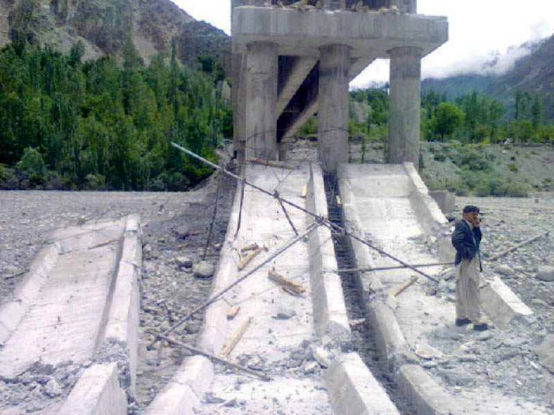 rcc bridge connecting shinaki area of hunza with karakoram highway collapsed on tuesday before its construction was complete photo courtesy amjad barcha