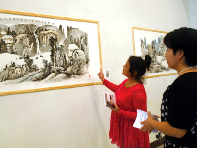 unique aesthetics a display of artwork showcasing a landscape above and floral motifs unique to china at pnca photo agha mehroz express unique aesthetics a display of artwork showcasing a landscape above and floral motifs unique to china at pnca photo agha mehroz express