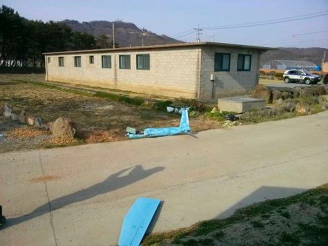 a crashed unmanned drone is seen on baengnyeong an island near the border with north korea on april 1 2014 photo reuters