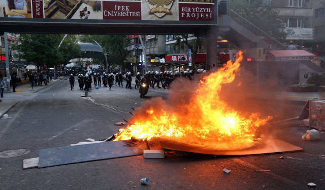 a fire is seen in a street of ankara on may 14 2014 during a demonstration gathering hundreds after more than 200 people were killed in an explosion at a mine police fired tear gas and water cannon when around 800 protesters shouting slogans against the government faced police intervention attempted to march from the middle east technical university to the energy ministry photo afp a fire is seen in a street of ankara on may 14 2014 during a demonstration gathering hundreds after more than 200 people were killed in an explosion at a mine police fired tear gas and water cannon when around 800 protesters shouting slogans against the government faced police intervention attempted to march from the middle east technical university to the energy ministry photo afp