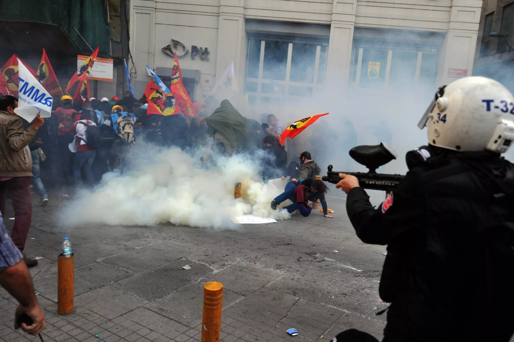riot police disperse protestors with tear gas and rubber bullets during a protest at istiklal avenue in istanbul on may 14 2014 photo afp riot police disperse protestors with tear gas and rubber bullets during a protest at istiklal avenue in istanbul on may 14 2014 photo afp