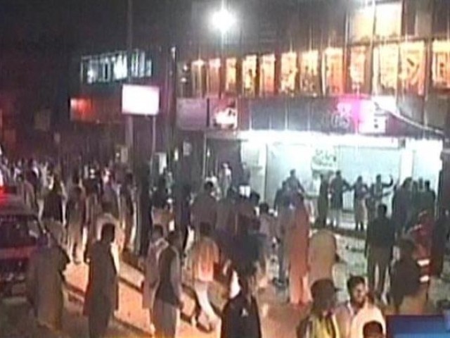 people gathered outside the restaurant after the blast photo screenshot