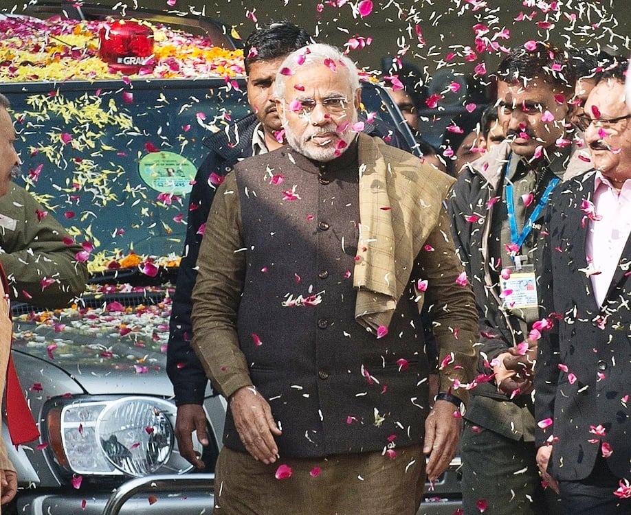 in this photograph taken on december 24 2013 chief minister of the western indian state of gujarat and bharatiya janata party bjp prime ministerial candidate narendra modi arrives for the bjp 039 s chief ministers 039 conference at the party headquarters in new delhi photo afp