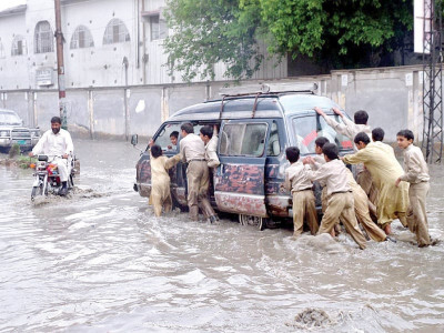balochistan rains three swept away by flash flood in mach