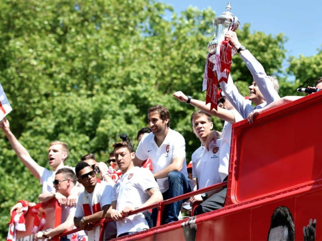 after nine long years of dust accumulating in arsenal s trophy cabinet the club rejoiced their victory against hull in the fa cup final on saturday photo afp after nine long years of dust accumulating in arsenal s trophy cabinet the club rejoiced their victory against hull in the fa cup final on saturday photo afp