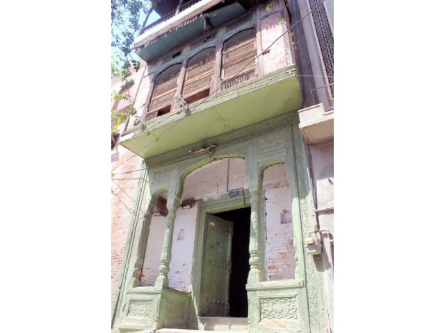 a plaque in persian on ex president yahya khan s house says it was built in 1890 on the left is the view of the house photo muhammad iqbal express a plaque in persian on ex president yahya khan s house says it was built in 1890 on the left is the view of the house photo muhammad iqbal express