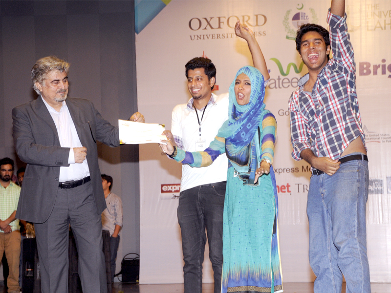 career expo in the picture above artist and actor jamal shah awards certificates to students showing outstanding performance photo waseem nazir express