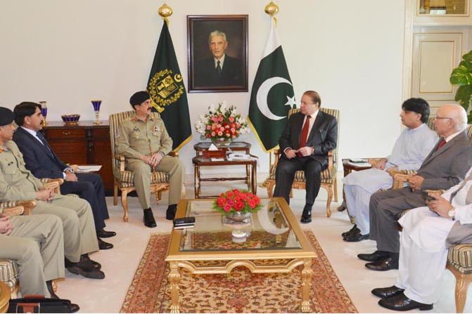 prime minister nawaz sharif chairing a high level meeting to review the national and regional security situation at prime minister house on may 20 2014 photo pid