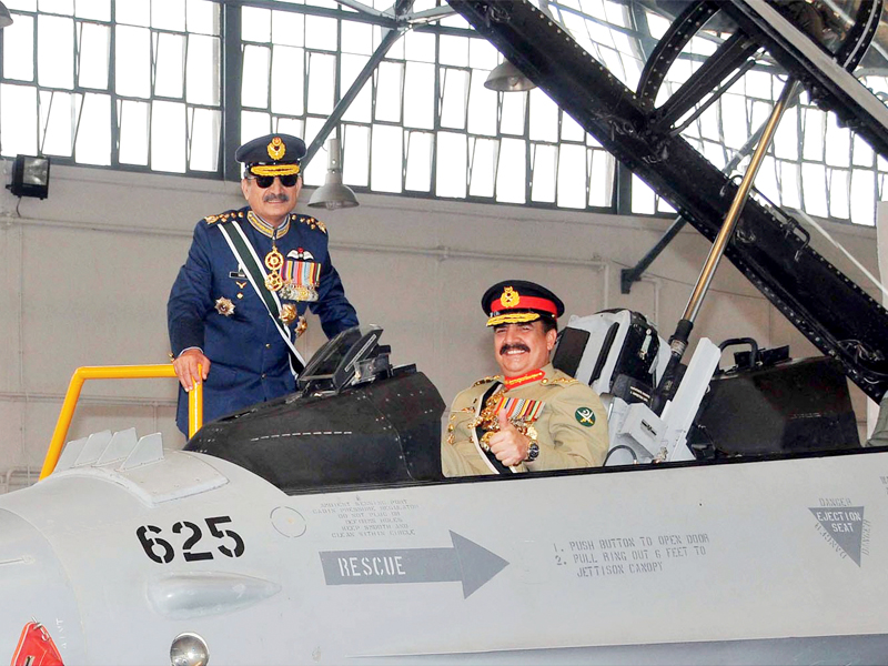 army chief gen raheel sharif inspects a newly arrived f 16 alongside air chief marshal tahir rafique butt photo inp