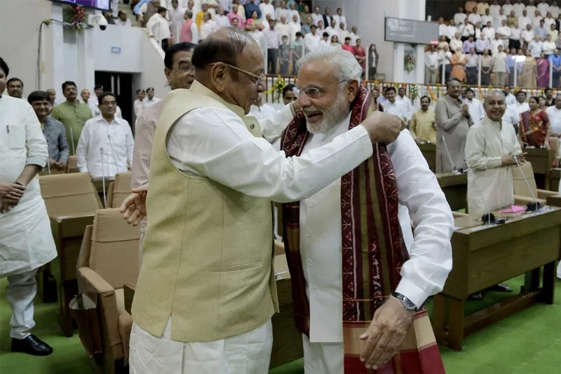 the leader of opposition congress shankersinh waghela l gifts a traditional khes or a shawl to indian prime minister elect narendra modi during a special farewell session of gujarat assembly in gandhinagar photo afp the leader of opposition congress shankersinh waghela l gifts a traditional khes or a shawl to indian prime minister elect narendra modi during a special farewell session of gujarat assembly in gandhinagar photo afp