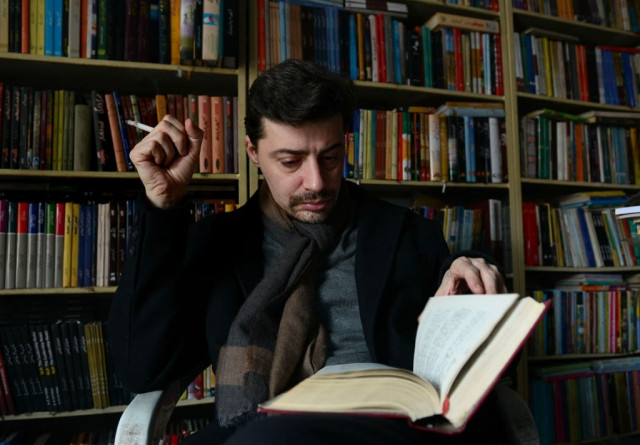 frenchman julien columeau reading in urdu at a bookstore in lahore photo afp frenchman julien columeau reading in urdu at a bookstore in lahore photo afp