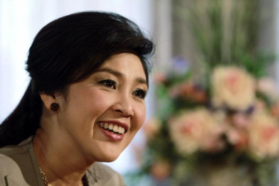 opposition to thai coup simmers ex pm in safe place