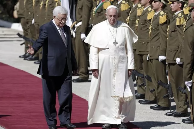 pope francis and palestinian president mahmud abbas l review troops as they arrive at the presidential palace for a welcoming ceremony on may 25 2014 pope francis arrived in bethlehem to begin the most sensitive part of his three day middle east tour aimed at forging regional peace and easing an age old rift within christianity photo afp pope francis and palestinian president mahmud abbas l review troops as they arrive at the presidential palace for a welcoming ceremony on may 25 2014 pope francis arrived in bethlehem to begin the most sensitive part of his three day middle east tour aimed at forging regional peace and easing an age old rift within christianity photo afp