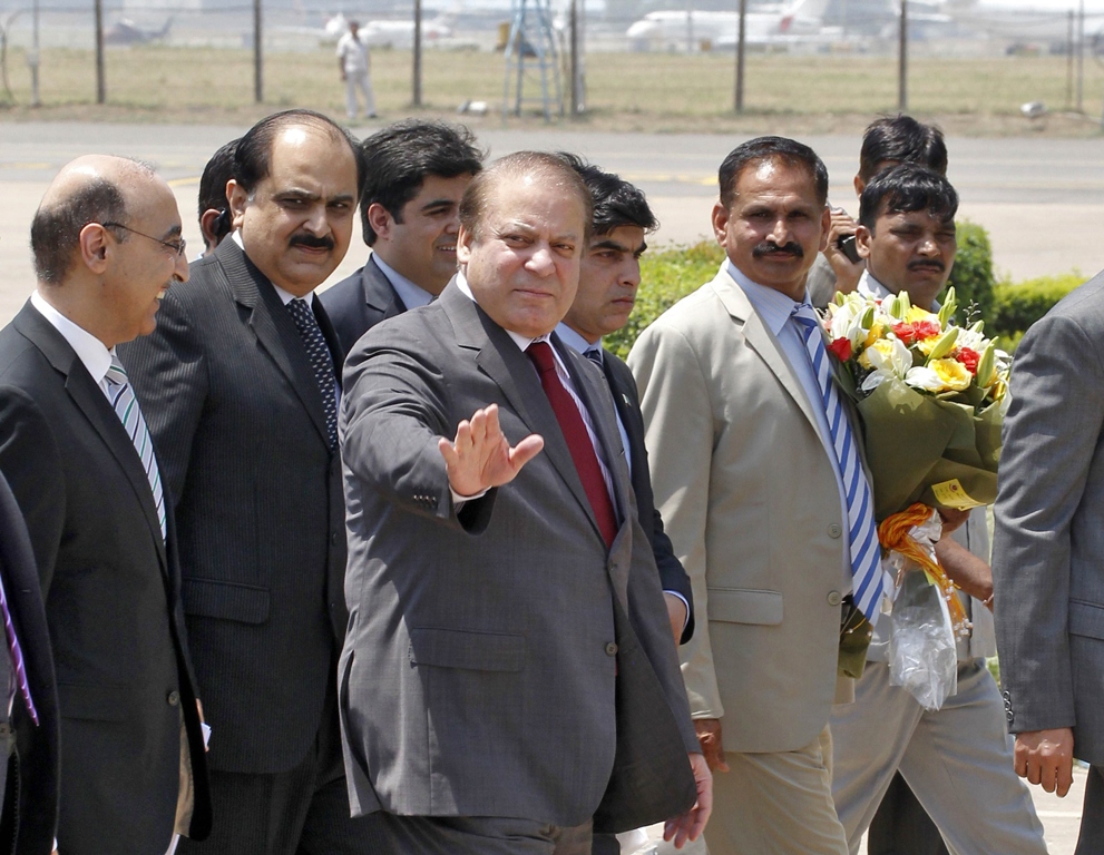 prime minister nawaz sharif waves upon his arrival at the airport in new delhi may 26 2014 photo reuters