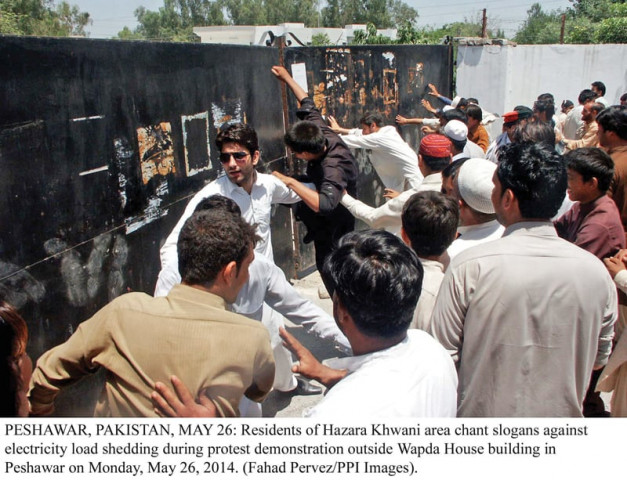 protesters tried to besiege wapda house during demonstrations against power outages in the city photo ppi protesters tried to besiege wapda house during demonstrations against power outages in the city photo ppi