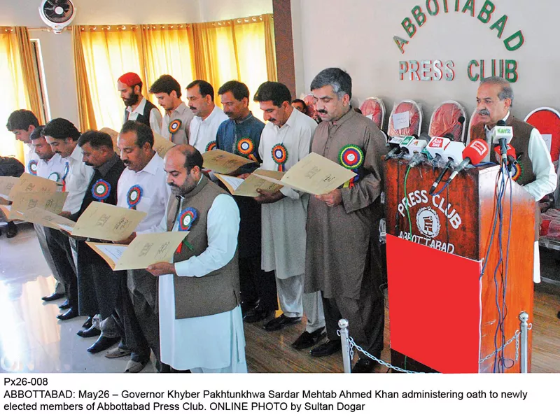 governor mehtab abbasi presiding over the oath taking ceremony of newly elected members of abbottabad press club photo online governor mehtab abbasi presiding over the oath taking ceremony of newly elected members of abbottabad press club photo online