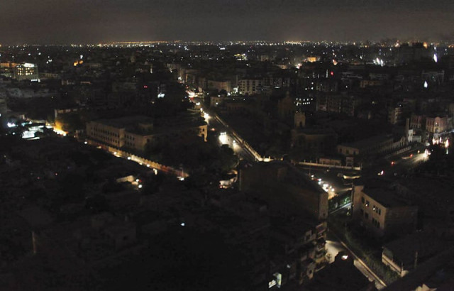 large parts of the city plunged into darkness as 14 k electric feeders tripped photo mohammad noman express large parts of the city plunged into darkness as 14 k electric feeders tripped photo mohammad noman express