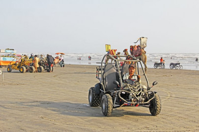 the sandy beach atvs take over as no one is quite shore who manages the beach