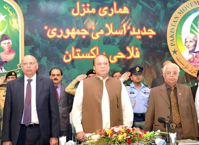 prime minister nawaz sharif and other dignitaries listening to national anthem during a function arranged in connection with the 16th yaum e takbeer on wednesday photo pid prime minister nawaz sharif and other dignitaries listening to national anthem during a function arranged in connection with the 16th yaum e takbeer on wednesday photo pid