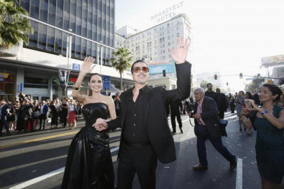 prankster hits brad pitt in the face at maleficent premiere prankster hits brad pitt in the face at maleficent premiere