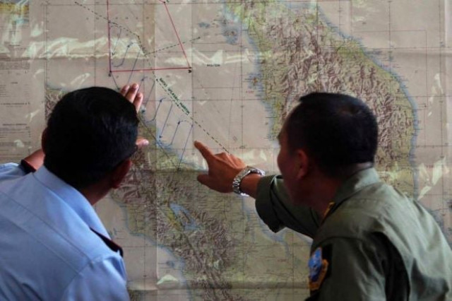 in this file photo indonesian air force officials in medan city military base plot military search operations for the missing malaysian airlines flight mh370 photo afp in this file photo indonesian air force officials in medan city military base plot military search operations for the missing malaysian airlines flight mh370 photo afp