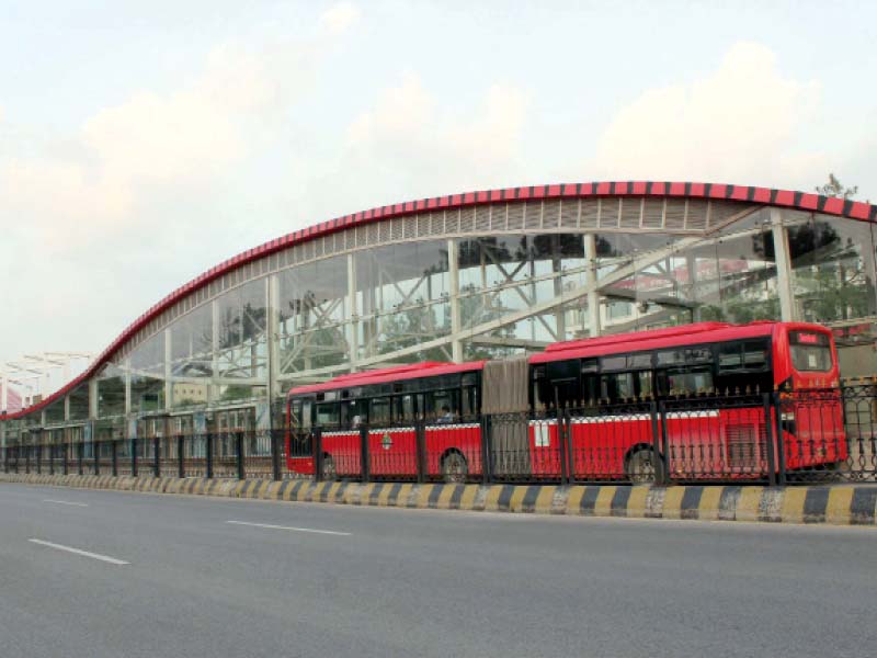 a metro bus comes to a terminal after the resumption of the service on wednesday photo express