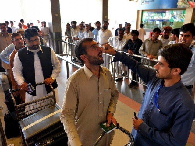 a passenger being administered polio drops at airport photo afp