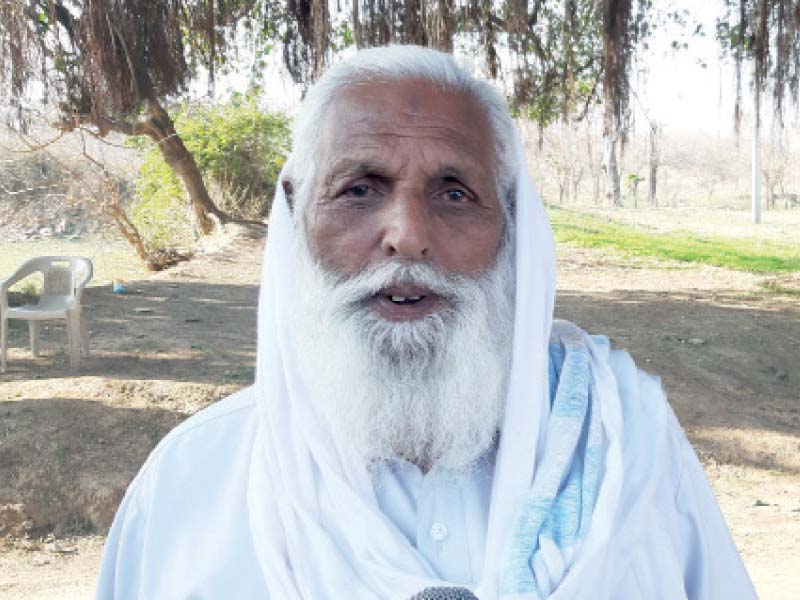 a resident of rawat muhammad miskeen talks about the century old tree which has come in the route of rawalpindi ring road photo express