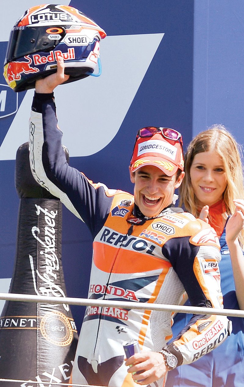 marquez gained the decisive lead in the final lap leaving lorenzo behind trying valiantly to pass him photo afp