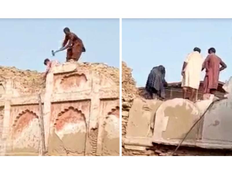 screen grab of a video made by a resident of the area shows labourers using sledgehammers on a wall of the pucca qila of hyderabad photo express