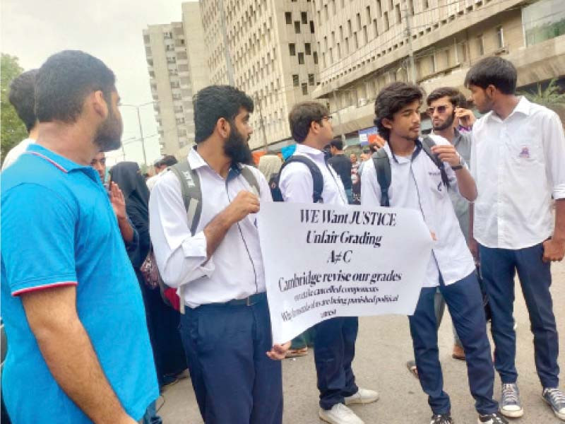 cambridge students stage a protest outside the karachi press club on tuesday against what they termed average marking in their as and a levels papers photo express