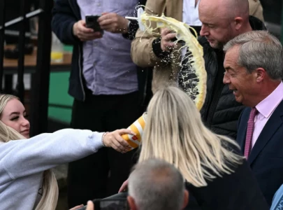 watch nigel farage hit with milkshake by protester on first day of campaign watch nigel farage hit with milkshake by protester on first day of campaign