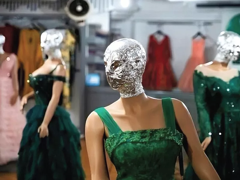 the heads of the mannequins sporting each dress are wrapped in plastic foil or black bags photo file the heads of the mannequins sporting each dress are wrapped in plastic foil or black bags photo file