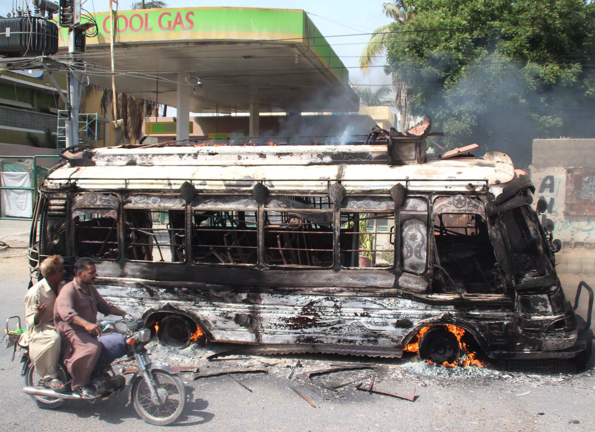 the law enforcement agencies were deployed in most parts of the city but unidentified men managed to torch 16 vehicles including public buses and some cars photo express the law enforcement agencies were deployed in most parts of the city but unidentified men managed to torch 16 vehicles including public buses and some cars photo express