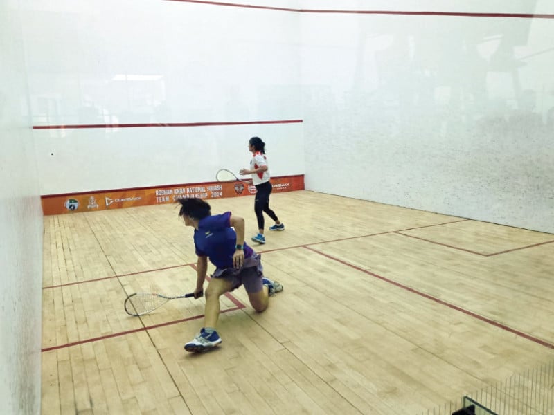 a view of the women s match between army and wapda at the combaxx roshan khan national team squash championship on monday photo app