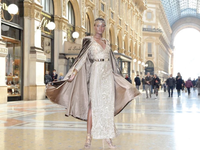 Armani and Gucci runway fashion show image