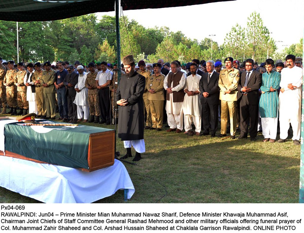 prime minister nawaz sharif defence minister khawaja asif chairman joint chiefs of staff committee general rashid mehmood and other military officials offering funeral prayer of col muhammad zahir and col arshad hussain at chaklala photo online