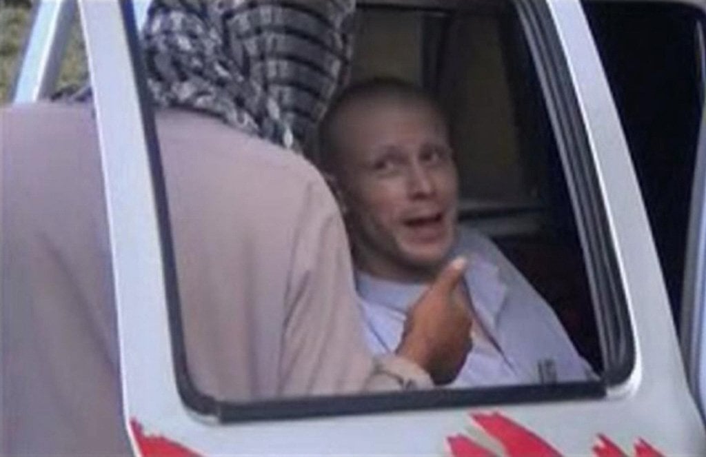 us army sergeant bowe bergdahl r talks to a taliban militant as he waits in a pick up truck before his release at the afghan border in this still image from video released june 4 2014 photo reuters