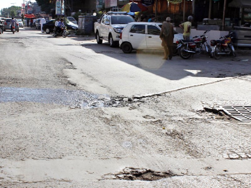 a dilapidated road in a market in sector g 9 4 photo muhammad javaid