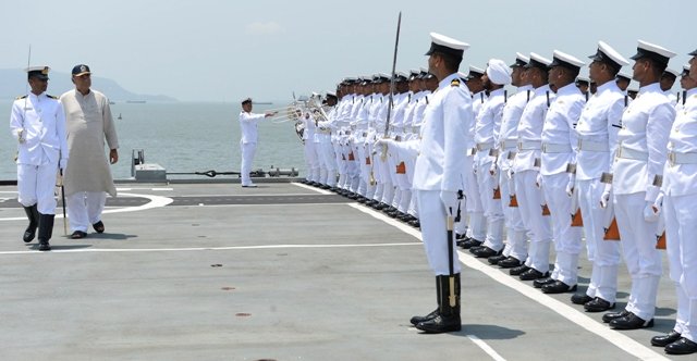 indian defence minister arun jaitley inspects a guard of honour on board the indian navy 039 s aircraft carrier ins viraat in mumbai photo afp