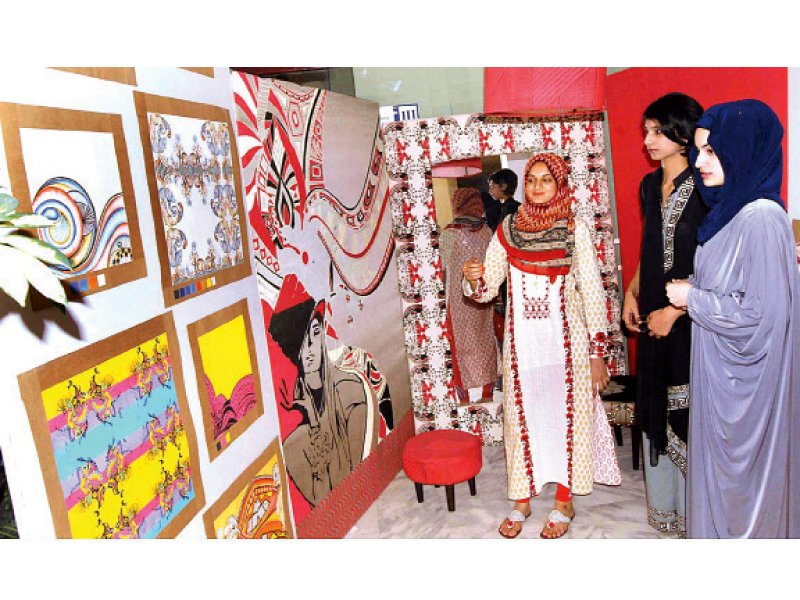 visitors take keen interest in the thesis display of textile design students of the iqra university photo app