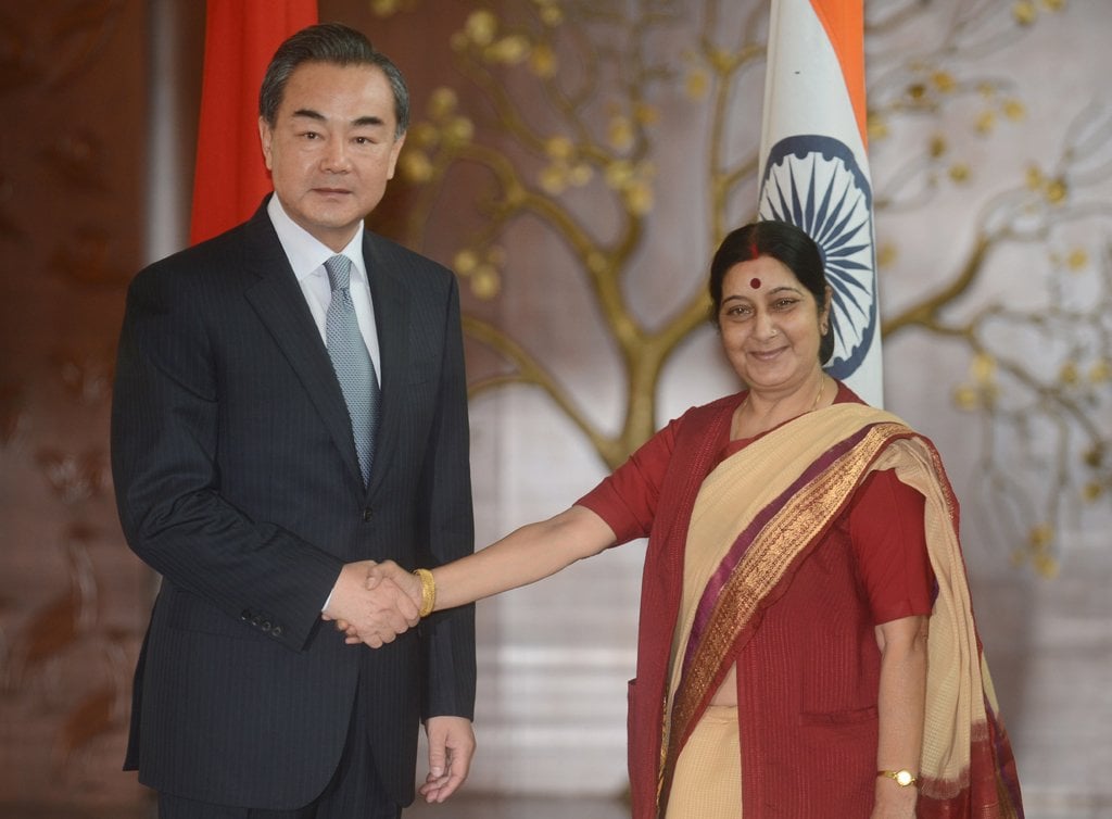 visiting chinese foreign affairs minister wang yi l shakes hands with indian minister for external affairs sushma swaraj during a meeting in new delhi on june 8 2014 photo afp