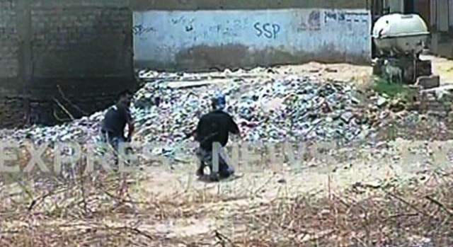 express news screengrab of asf personnel taking position after the fresh attack near karachi airport express news screengrab of asf personnel taking position after the fresh attack near karachi airport