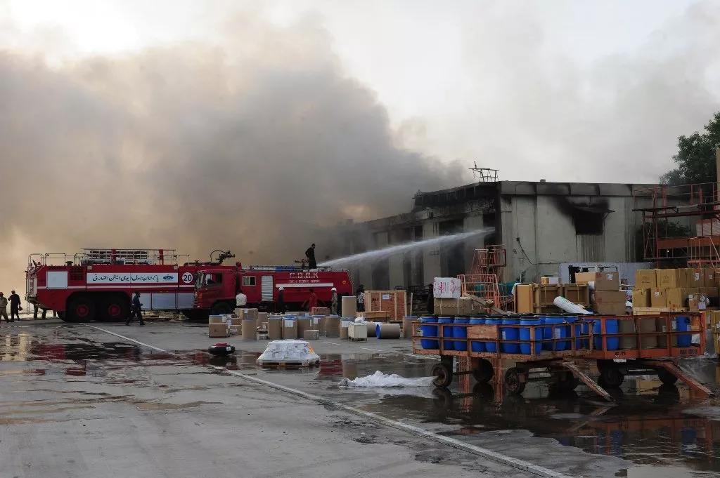 smoke rises after militants launched an assault at jinnah international airport in karachi photo afp smoke rises after militants launched an assault at jinnah international airport in karachi photo afp