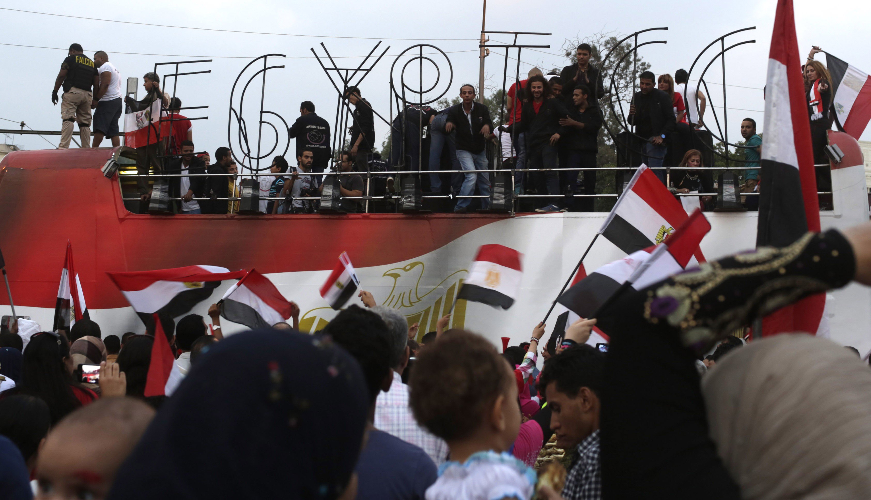 people ride a bus with letters spelling quot egypt cc quot as egyptians celebrate after the swearing in ceremony of president elect abdel fattah al sisi in cairo june 8 2014 photo reuters file